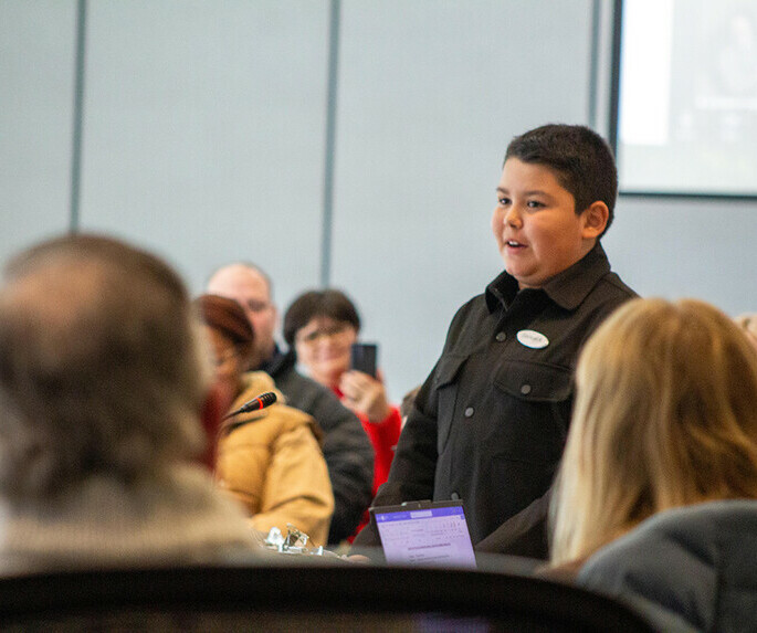 Student talking in a group